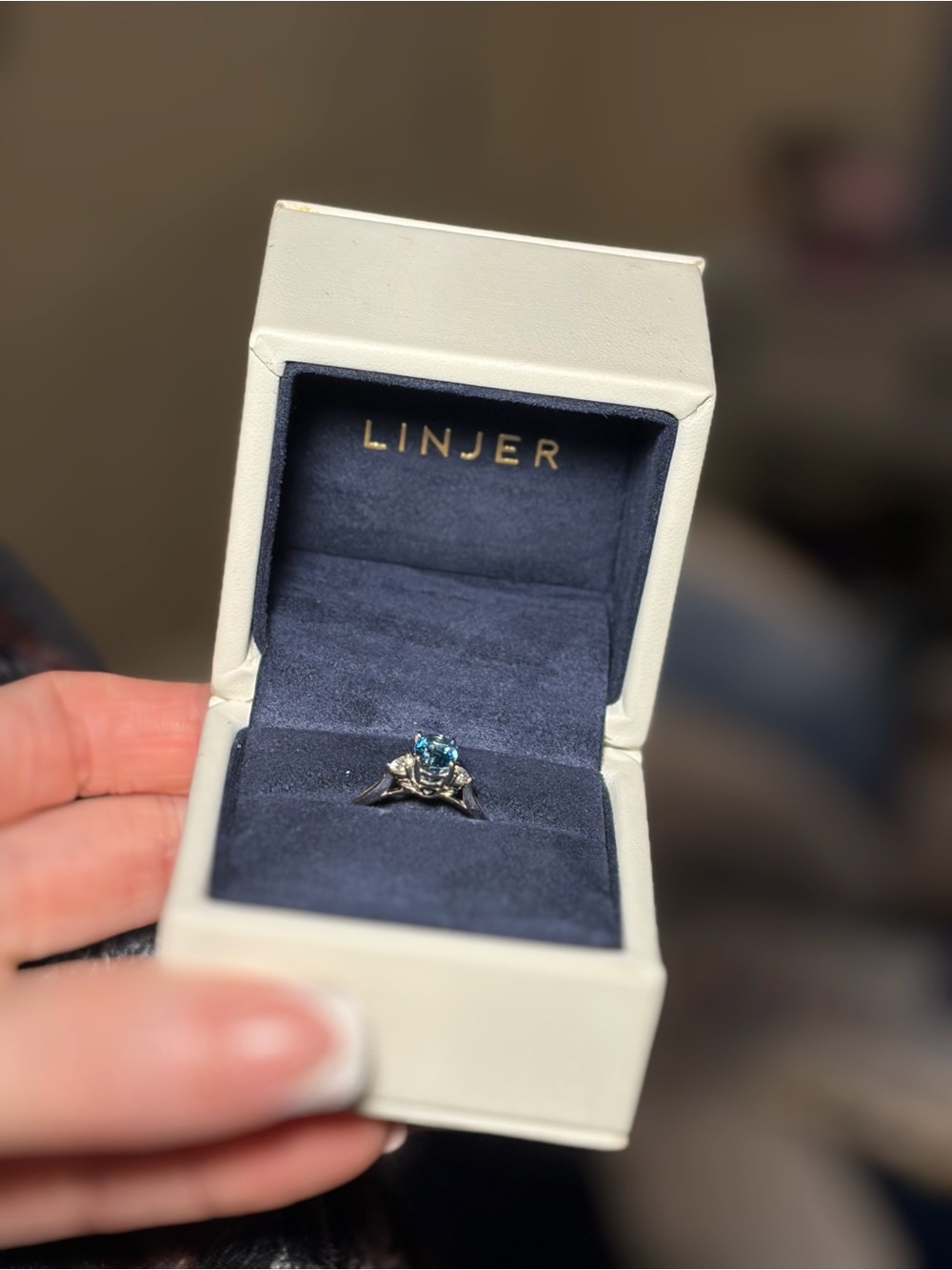 LINJER Silver Ring with Teal Blue Center Stone